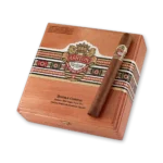 Charuto Ashton Heritage Puro Sol Double Corona apoiado sobre a caixa de madeira fechada